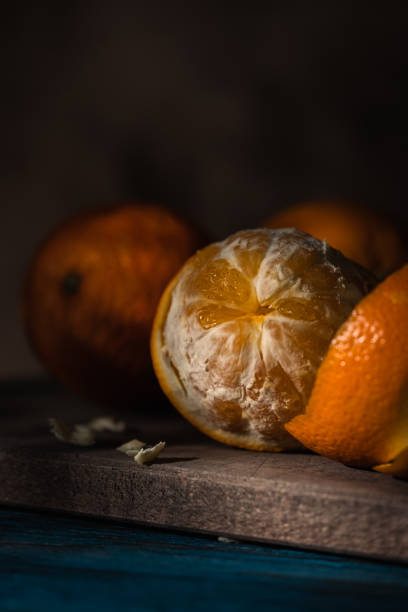 istock Close up on oranges on rustic wooden table. 1450391884