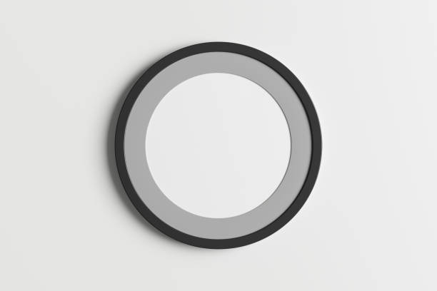 istock Dark wooden round frame poster mock up on the white wall. 1450395963