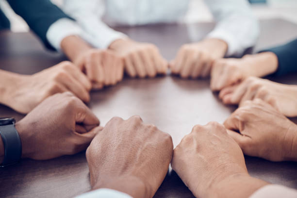 istock Teamwork, support and business people hands in circle, together in a meeting. Diversity, community and collaboration in office with team connect fist for motivation, inspiration and team building 1450398514