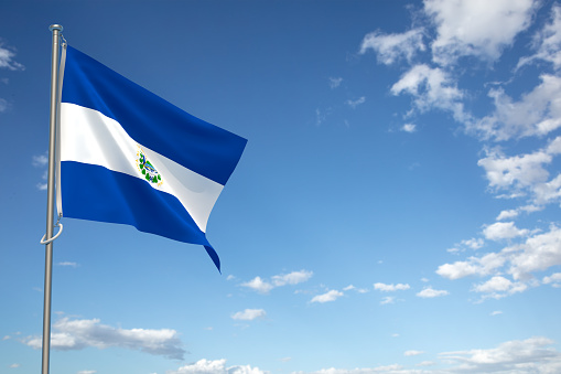 Republic of El Salvador flags over blue sky background. 3D illustration