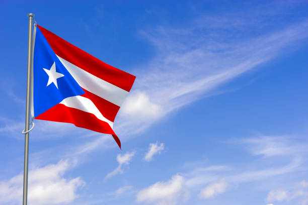 istock Puerto Rico flags over blue sky background. 3D illustration 1450399117