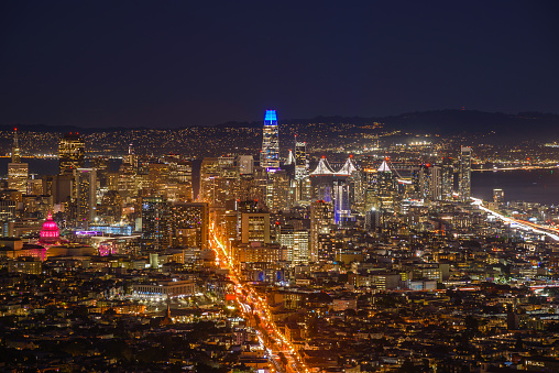 View of San Francisco downtown and financial district skyline at night in autumn. California, USA.