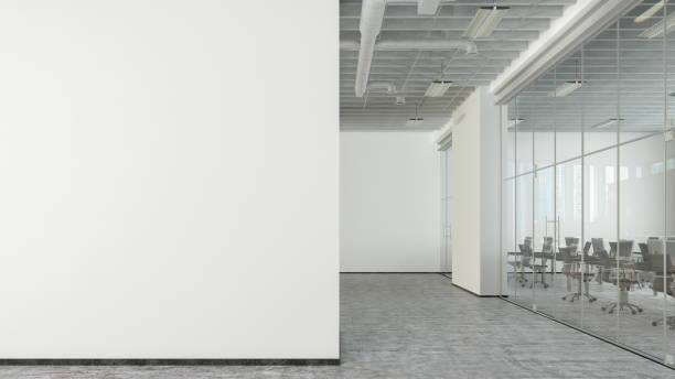 istock Blank white office wall mock up in modern office interior. 1450399867