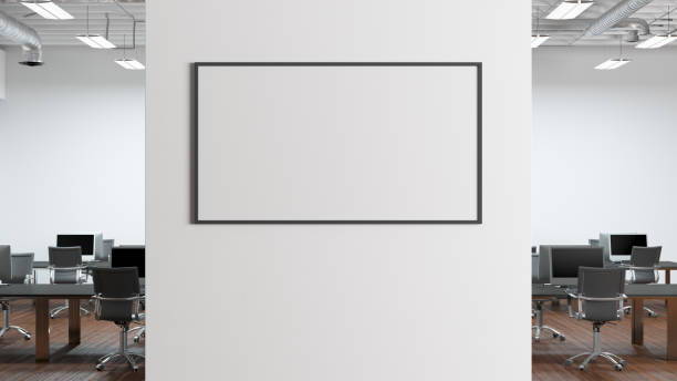 istock Blank horizontal poster mock up on the wall of modern office interior. 1450400534