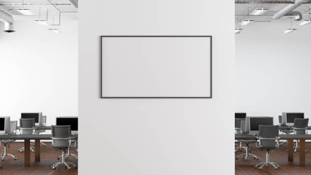 istock Blank horizontal poster mock up on the wall of modern office interior. 1450401095