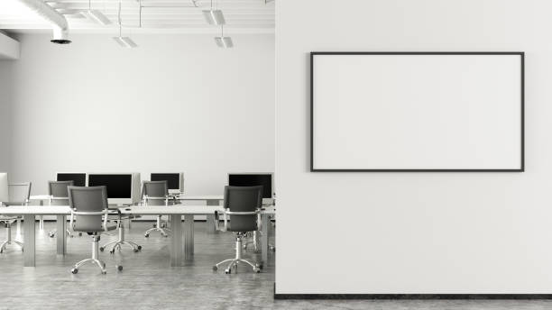 istock Blank horizontal poster mock up on the wall of modern office interior. 1450401548