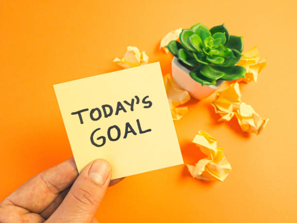 istock Today`s goal text handwritten on sticky note. Priority, planning, business strategy and motivation concept 1450404673