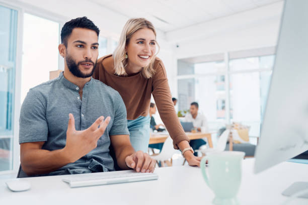 istock Startup, strategy and team at computer in office for website ux planning, brainstorming and idea. Web design and communication of creative people for project analysis, advice and development. 1450406626