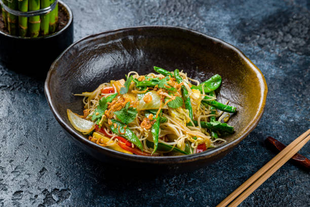 istock glass noodles with vegetables on dark stone table 1450407439