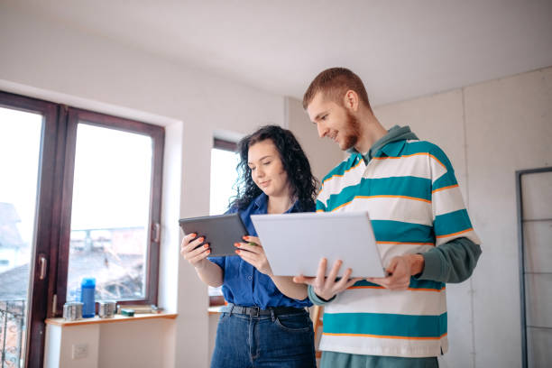istock Young couple in new home 1450413260
