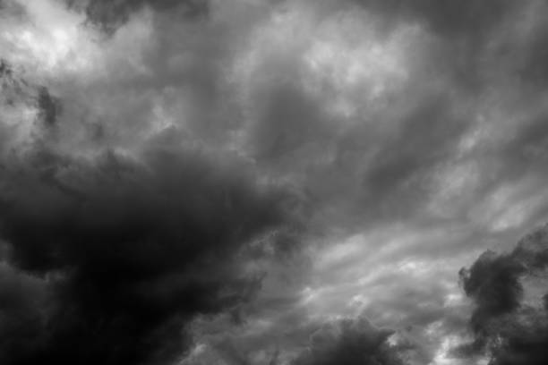 istock Black and white shot of stormy clouds 1450413710