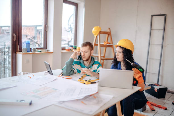 istock Young couple in new home 1450413714
