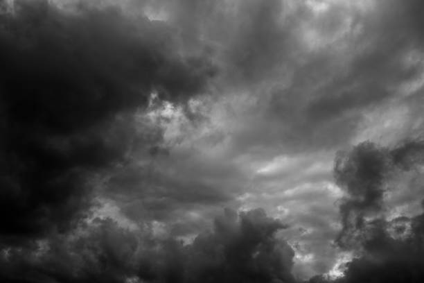 istock Black and white shot of stormy clouds 1450413729