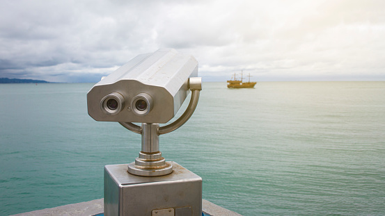 Binoculars in front of sea lookout