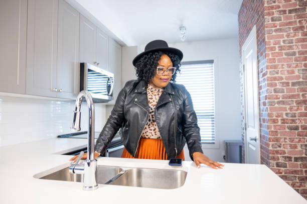 istock Young Woman On a House Tour 1450420439