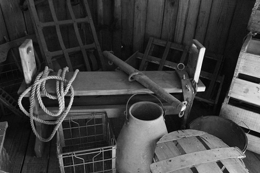 A black and white photo of old colonial tools