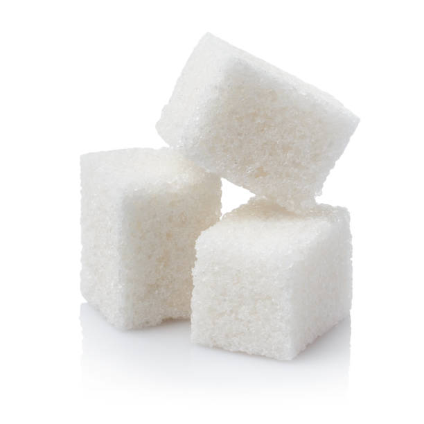 istock Close-up of three white sugar cubes on white 1450424712