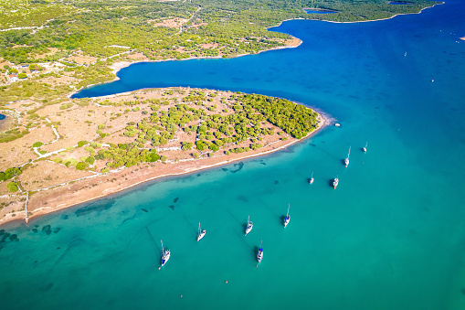 Turquoise sailing coasline on Cres island aerial view, archipelago of Croatia