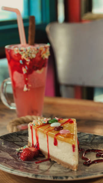 istock a slice of   tasted candy coated lemon cheesecake on a cafe table 1450430212