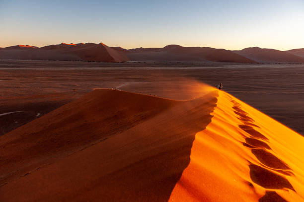 istock Climbing Dune 45 at sunrise 1450430407