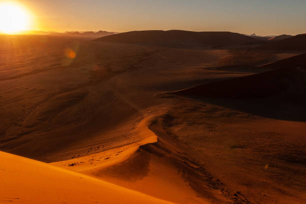 istock Climbing Dune 45 at sunrise 1450430456