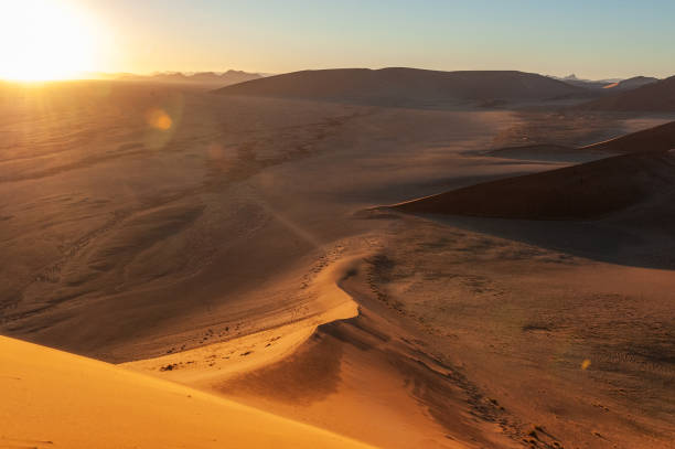 istock Climbing Dune 45 at sunrise 1450430461