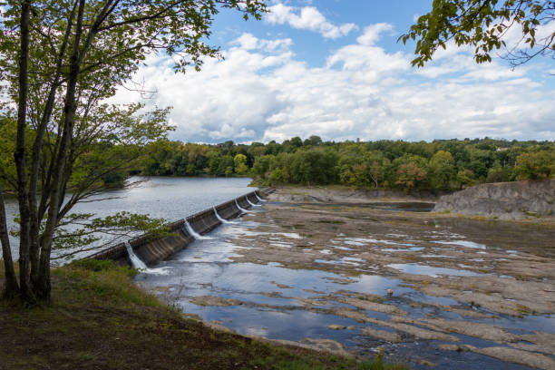 istock Water flowing over a dam 1450431550