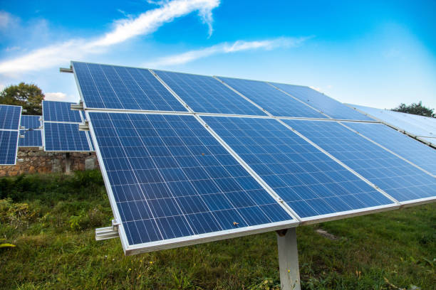 istock Solar panels on the field 1450439077