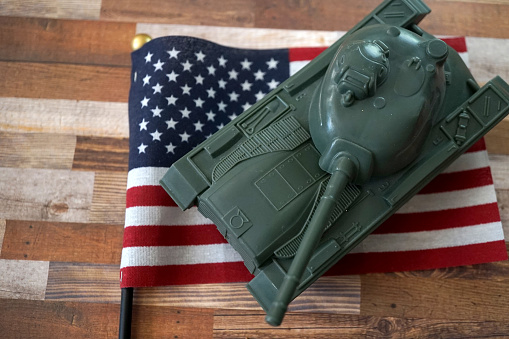 shot of tank and american flag