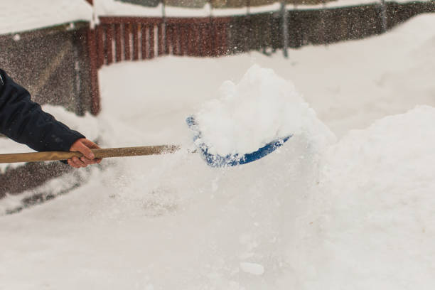 istock Snow shovel. Winter background. 1450443199