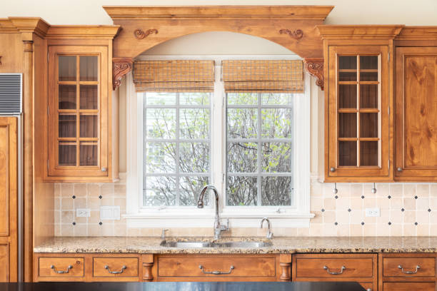 istock A kitchen detail with wood cabinets and tiled backsplash. 1450445014