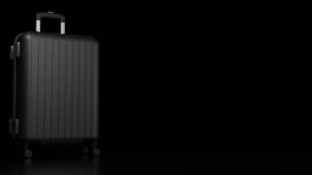 istock 3d rendering of isolated black travel suitcase on black background, with copy space. 1450449855