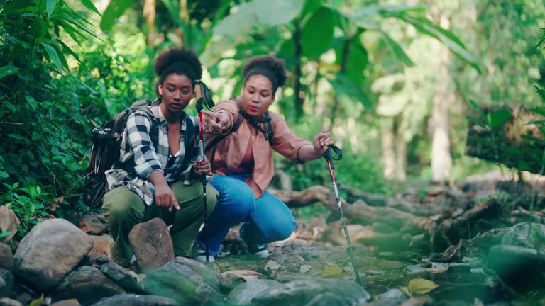 Two adolescents that enjoy trekking while on vacation