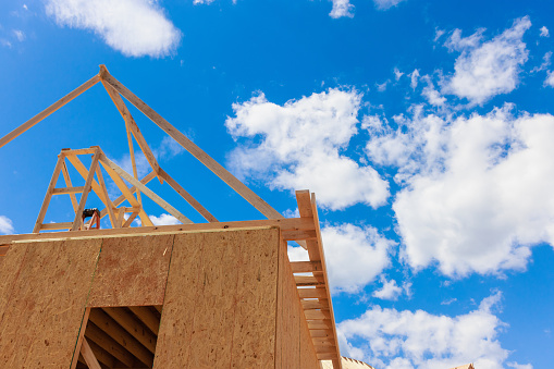 The construction of new family homes in a residential area is underway.