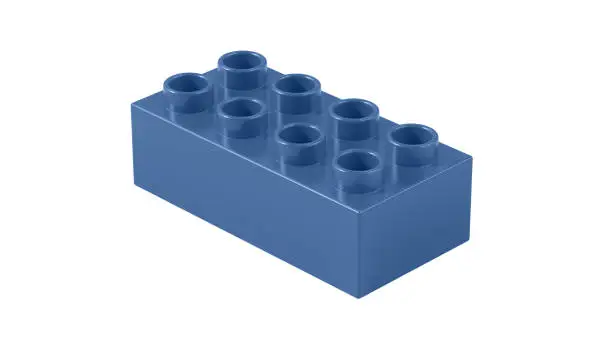 Photo of Cobalt Blue Plastic Toy Block Isolated on a White Background.
