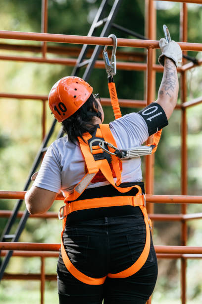 Rescuer climbing scaffolding