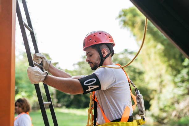 istock Rescuer climbing ladder to scaffold 1450460216