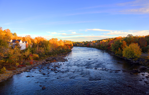 Autumn foliage along the Pleasant River near Milo, Maine