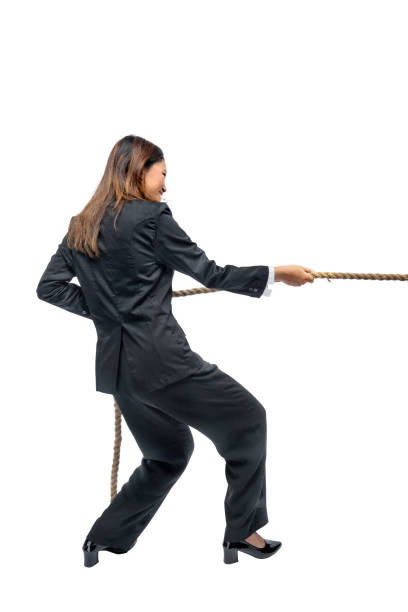 istock Asian businesswoman pulling rope 1450464774