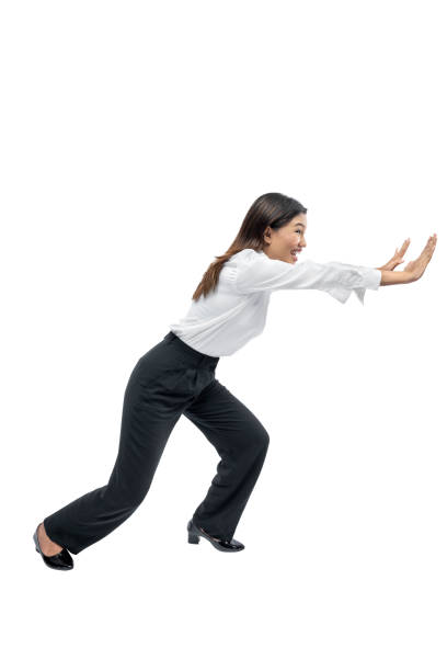 istock Asian businesswoman pushing something 1450464829
