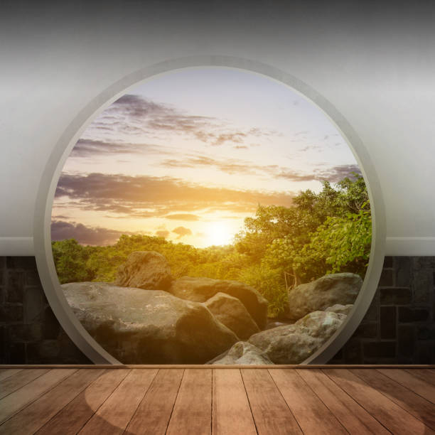 istock Circle gate with a view of green garden and trees 1450467912