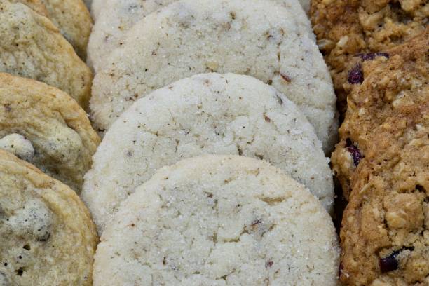 istock Home made assorted cookies arranged and displayed in rows vertically. 1450475640