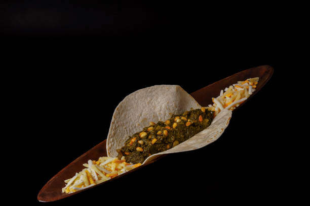 istock taco with spinach and pine nuts various types of cheese as garnish 1450519022