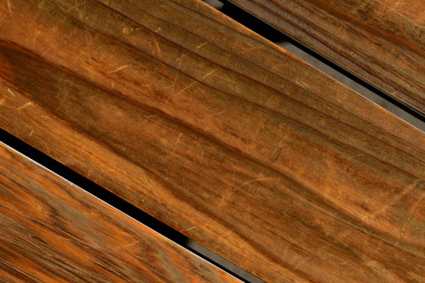 Overhead shot of weathered wooden deck textured.