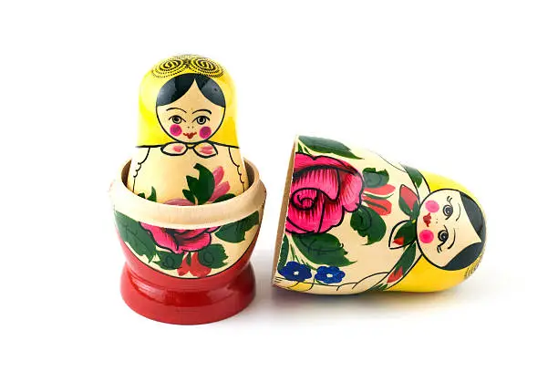Set of russian dolls of decreasing sizes. Usually are placed one inside another. Isolated on white