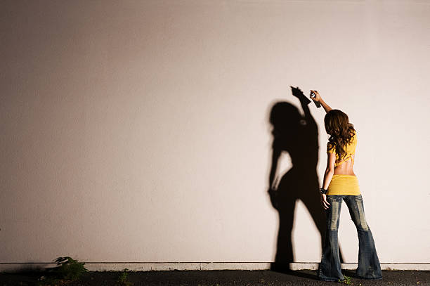 istock female graffiti artist with copyspace 145052222