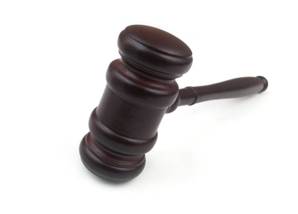 istock Wooden gavel isolated on white 1450531122