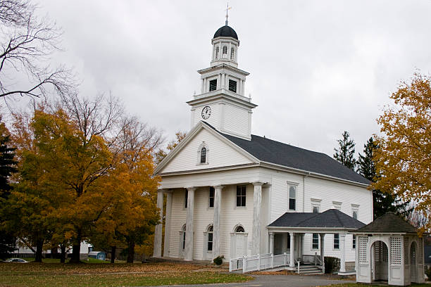 istock New England Church in Autumn 145053369