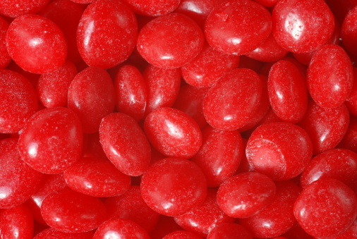 Red cinnamon candy can be used for background.