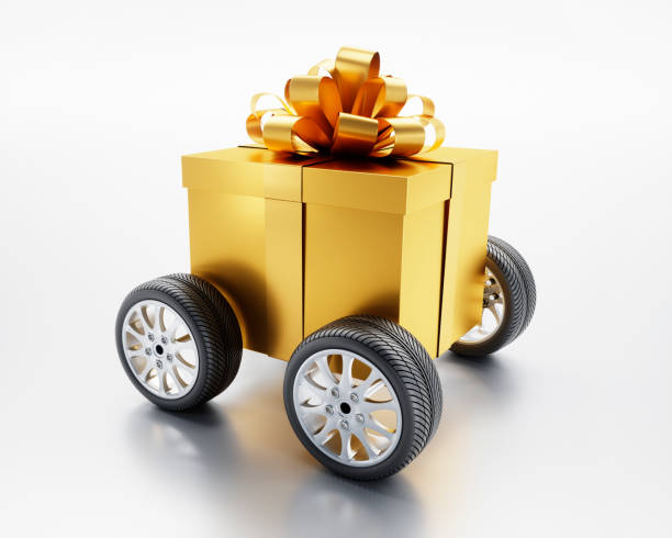 Golden Gift Box on car wheels